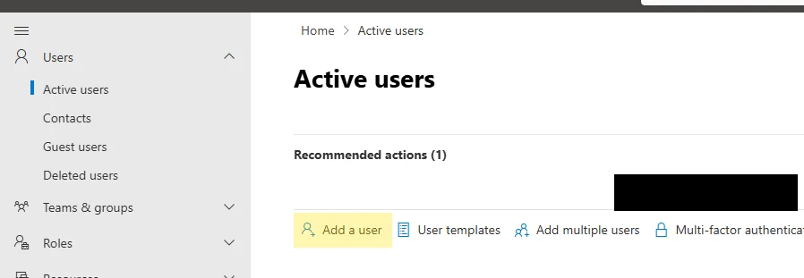 Microsoft 365 Add a user wizard — Basics screen with the SBC domain selected in the Domains dropdown